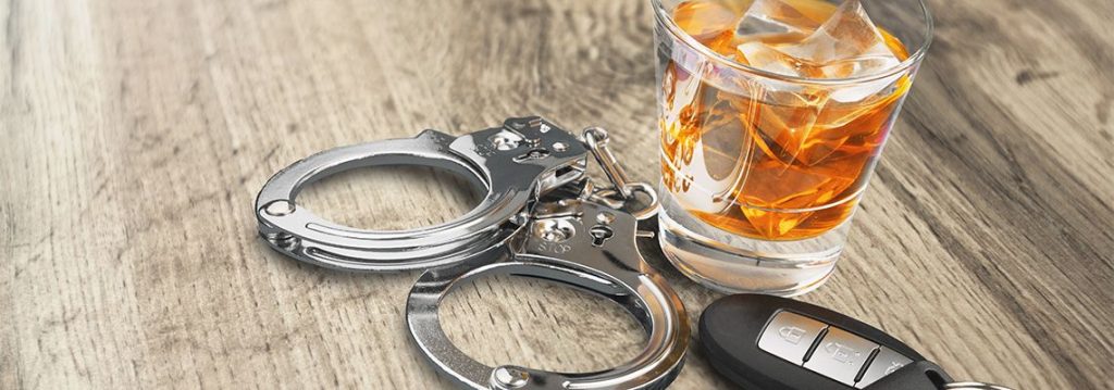 82174-car-keys-glass-of-alcohol-and-handcuffs-602ae9fb