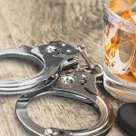 82174-car-keys-glass-of-alcohol-and-handcuffs-602ae9fb