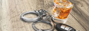 82174-car-keys-glass-of-alcohol-and-handcuffs-602ae9fb